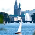 Sailboats on the Alster Lake on a summer evening